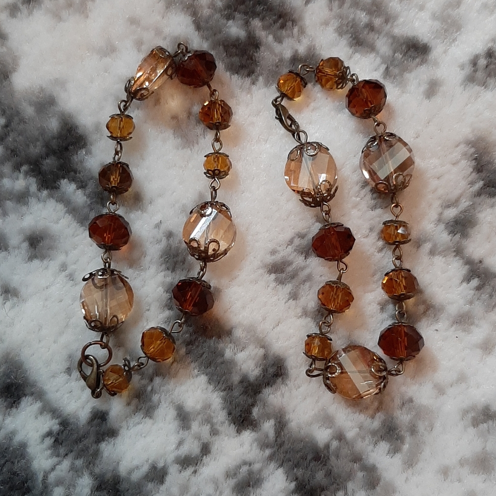 2 bracelets, glass, artist made.